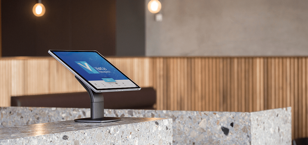 VisitUs iPad on a stone reception desk
