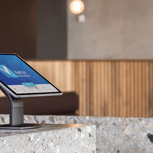 VisitUs iPad on a stone reception desk